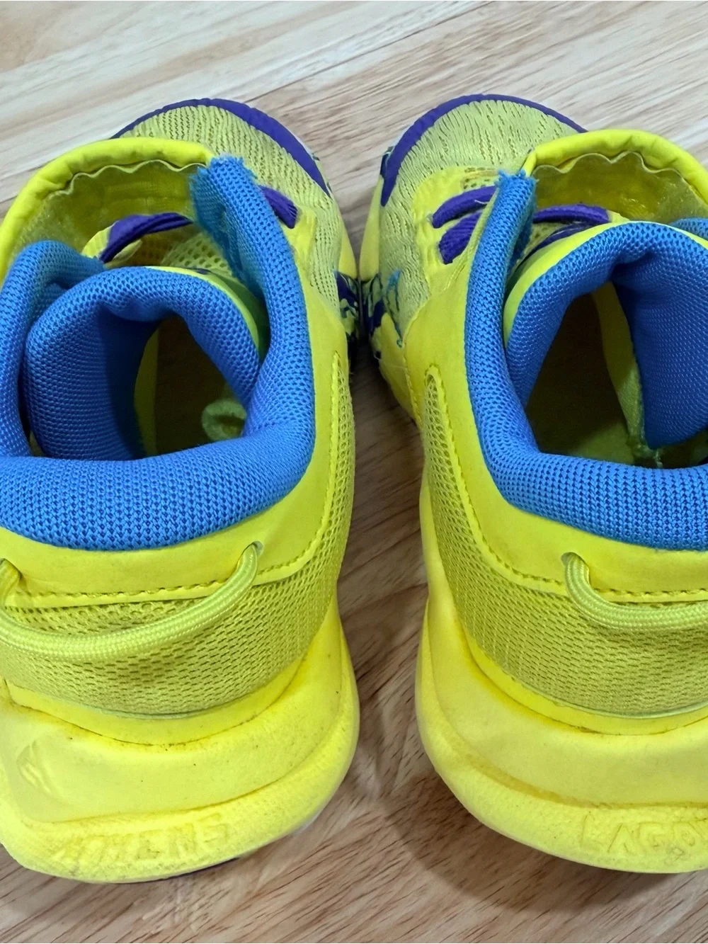 Nike Kids Yellow Sneakers with Blue Accents